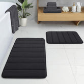 BYSURE front view of both black bath mats showing modern coverage and comfort
