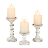 Candeldo front view of three white wooden holders showing matte finish and balance
