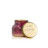 Capri Blue glimmer front jar showing festive metallic finish and elegant label benefit: decorative holiday focal point