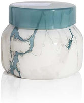 Capri Blue Modern Marble front view showing jar and Volcano scent benefit