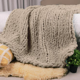 Carriediosa front view of taupe throw showing oversized cozy benefit