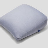 casper full-length gray pillow on bed showing shape and support