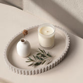 Cathyeen oval tray front view showing cream gray finish and minimalist shape for styling
