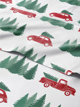 CGK Unlimited front view of Christmas tree sheet set showing festive pattern and complete set benefits