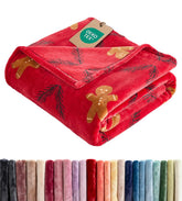 CGK Unlimited front view of gingerbread cookie fleece blanket showing pattern and color, festive decor benefit