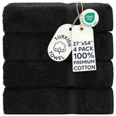 Chakir Turkish Linens front folded set showing four black towels and neat presentation, indicating coordinated styling