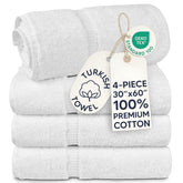 Chakir Turkish Linens front view of four white towels showing neat banded border and quantity benefit