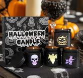 CHAMBERY front view of four black glass Halloween candles, stylish seasonal décor benefit