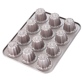 CHEFMADE front view of 12-cavity canelé pan showing champagne gold finish and uniform cavities, professional look