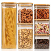 ComSaf front view showing six glass jars and bamboo lids for organized storage
