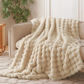 COOVA folded on sofa showing neat styling and cozy appeal