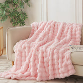 COOVA throw front view showing light pink color and elegant bubble design for decor