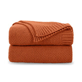CozeCube burnt orange folded throw showing neat front for warm accent
