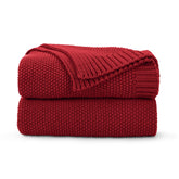 CozeCube folded Christmas red throw showcasing neat neatness and cozy appeal