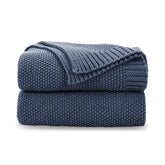CozeCube dusty blue throw front view showing neat seed-stitch and cozy appeal