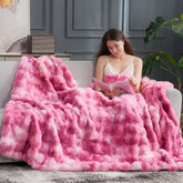 Cozy Bliss front view showing tie-dye pink throw and plush look