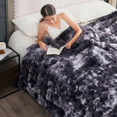 Cozy Bliss front view tie-dye black throw showing plush decorative layering