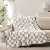 Cozzenity front view showing checkered throw packaging and elegant design benefit