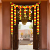 Daifunli front view garland showing vibrant orange yellow marigolds and bells for festive entry
