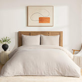 DAPU front view of duvet cover set showing minimalist packaging and linen benefit