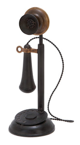 Deco 79 front view of black metal telephone sculpture showing nostalgic shape and charm