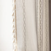Deeprove front panel showing cream boho curtain and soft light filtering