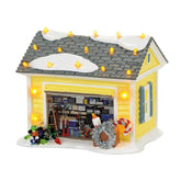 Department 56 Griswold garage front view showing lit facade and holiday charm