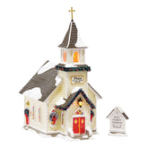 Department 56 front view of Holy Family Church showing architectural detail and curb appeal
