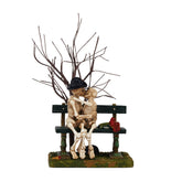 Department 56 front view of kissing skeletons figurine showing spooky focal point