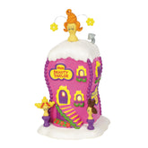 Department 56 La Boutique front view shows whimsical facade and bright colors for display appeal