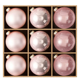 DN DECONATION front view of nine pink glass ornaments showing cohesive styling benefit