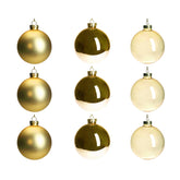 DN DECONATION front view of nine gold glass ornaments showing cohesive set and elegance