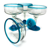 Dos Sueños front view of four glasses showing colorful aqua rims and unity