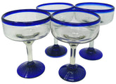 Dos Sueños set of four glasses arranged, showing colorful artisanal appeal