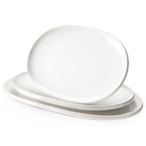 DOWAN front view of three white oval platters showcasing sizes and presentation benefits