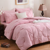DOWNCOOL front view of queen comforter set showing polished pink pintuck and bedding styling benefit