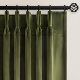 Drapenova front view closed forest green panels showing elegant blackout benefit