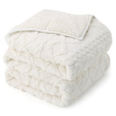 Drewin front folded cream queen blanket showing neat drape and cozy appeal