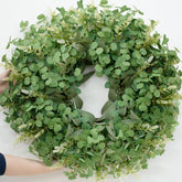 Dushle front door wreath displayed to add curb appeal