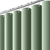 Dynamene front panel in sage green showing full curtain and elegant bathroom benefit