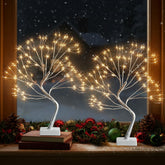 EAMBRITE front view of 17-inch silver fairy light tree showing warm glow and silhouette
