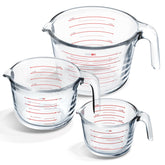 EATEX front view of three glass measuring cups showing sizes and clear markings for precision