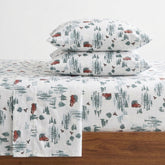 Eddie Bauer front view of Tree Farm light blue sheet set showing pattern and packaging, adds cozy style