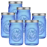eleganttime front view of six blue 32 oz jars showing included lids and bands