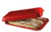 Emile Henry front view of burgundy baguette baker showing three loaf slots and lid, professional results