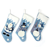 Etistta front view of three blue velvet stockings shows coordinated holiday styling and elegance