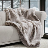 EverGrace front view of champagne fawn throw showing luxe packaging and size benefit