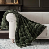 EverGrace front view green throw showcasing luxurious sculpted design and cozy appeal
