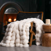 EverGrace ivory throw front view showing plush bubble texture and elegant look
