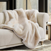 EverGrace folded front view showing Arctic White plush throw, enhances room comfort